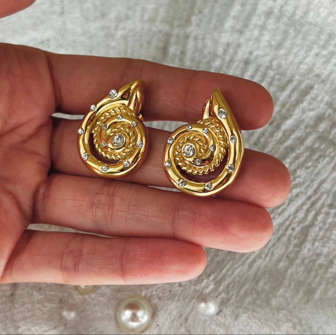 Studded snail earrings