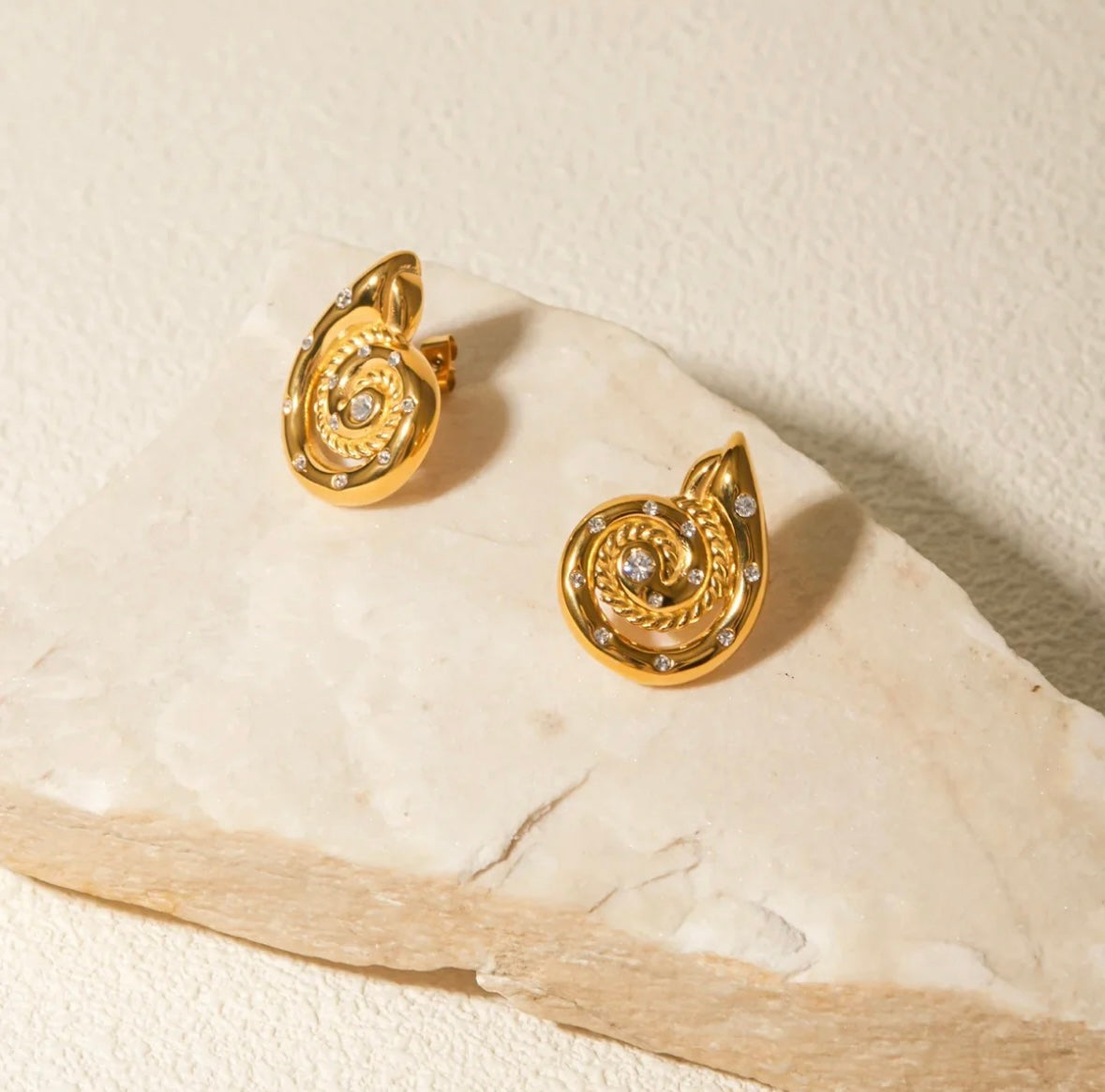 Studded snail earrings